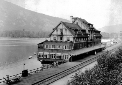 A black and white photo of a train station.