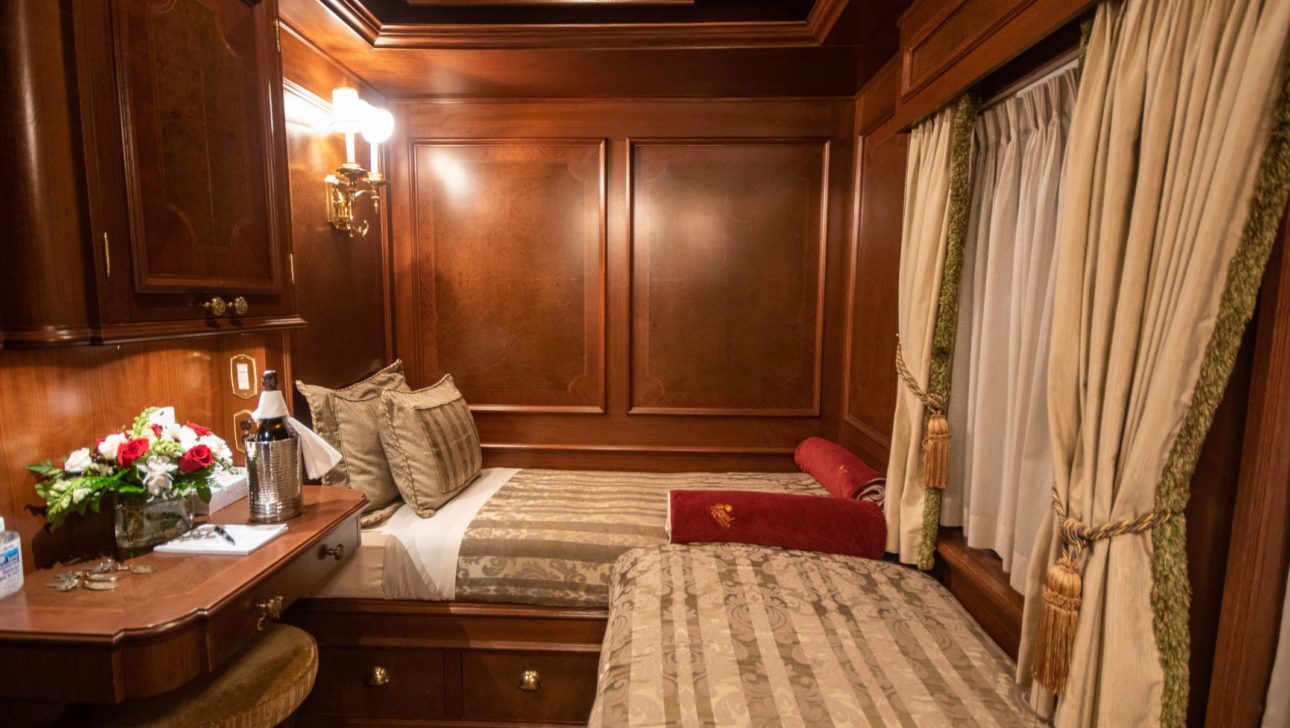 Two twin beds in a train car.